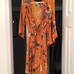 Mustard yellow floral wrap dress